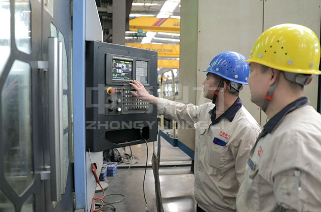 �������a